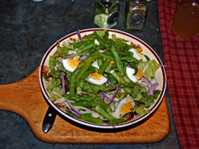 cooked asparagus on salad